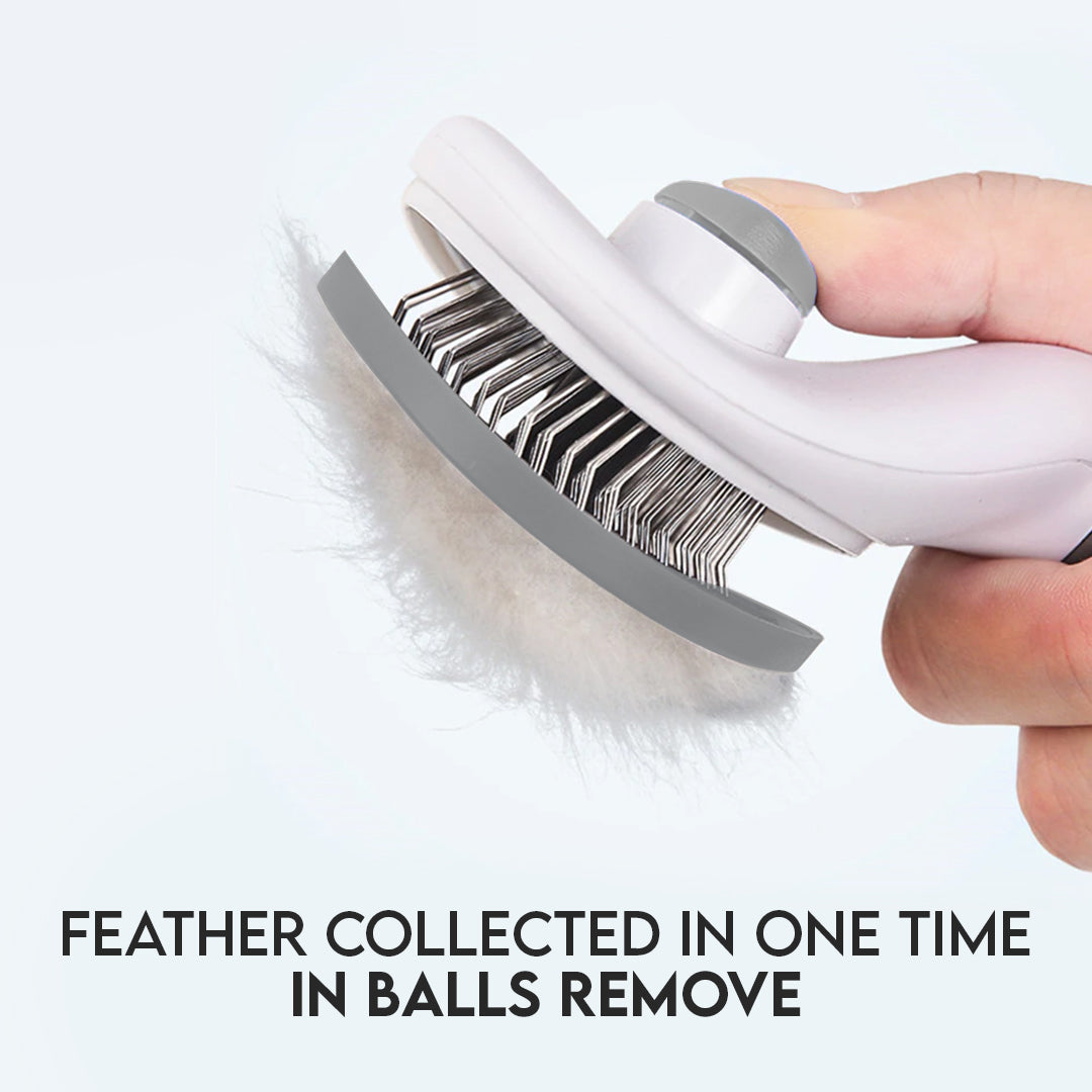 Push-button pet grooming brush releasing collected cat and dog hair